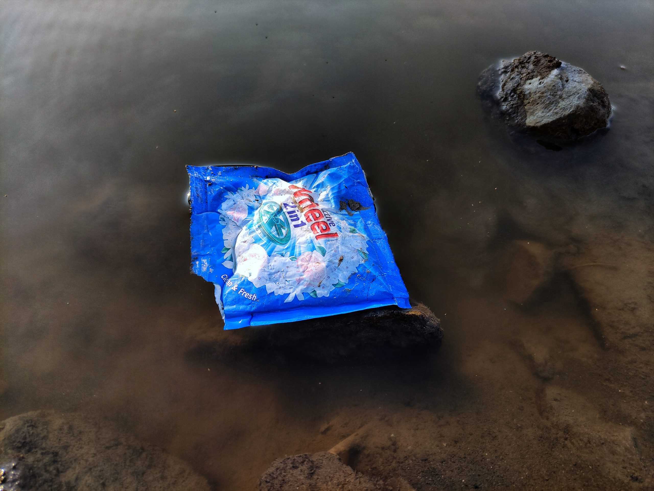 A plastic pack fallen in water