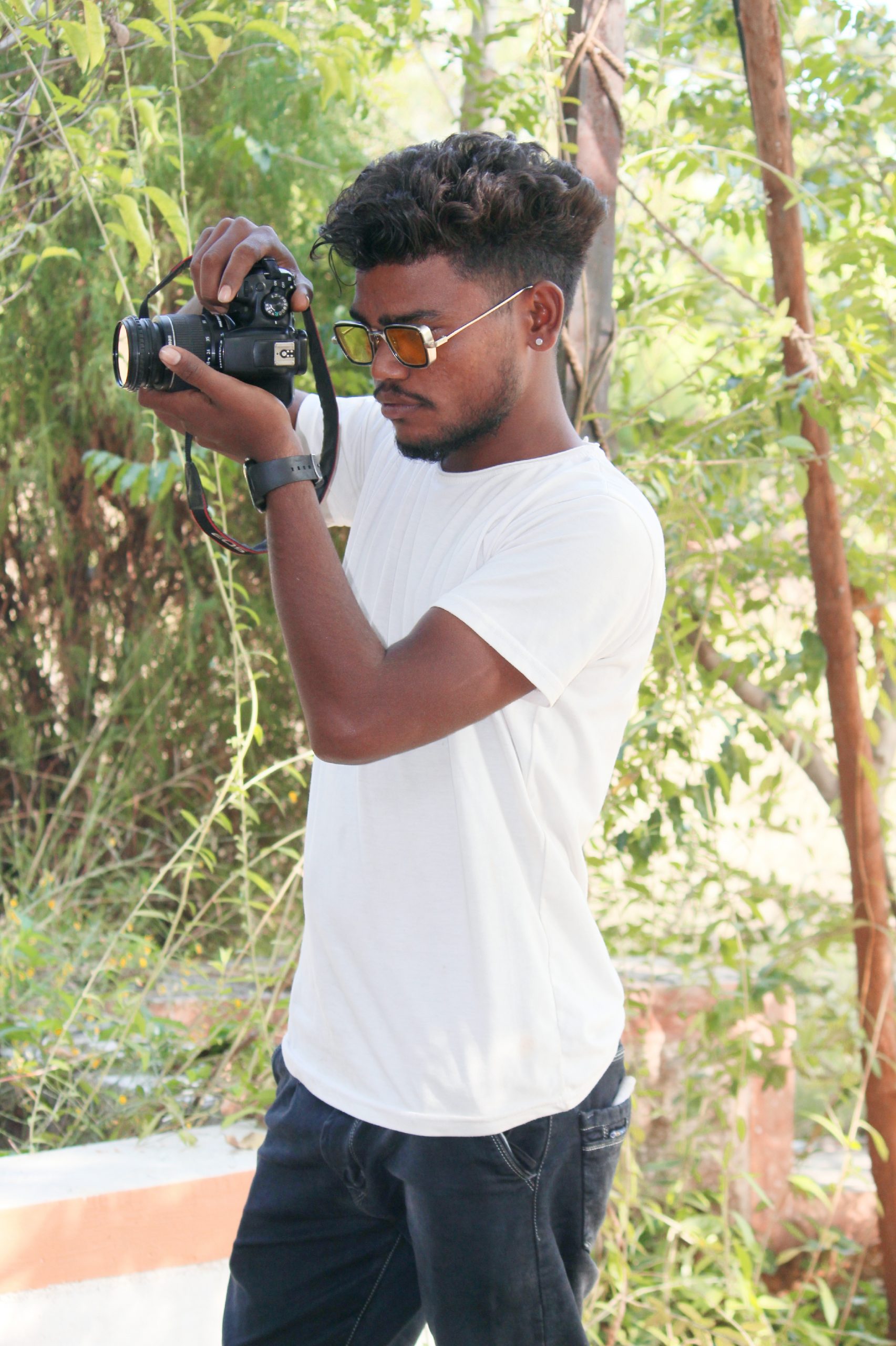 Boy clicking picture with camera