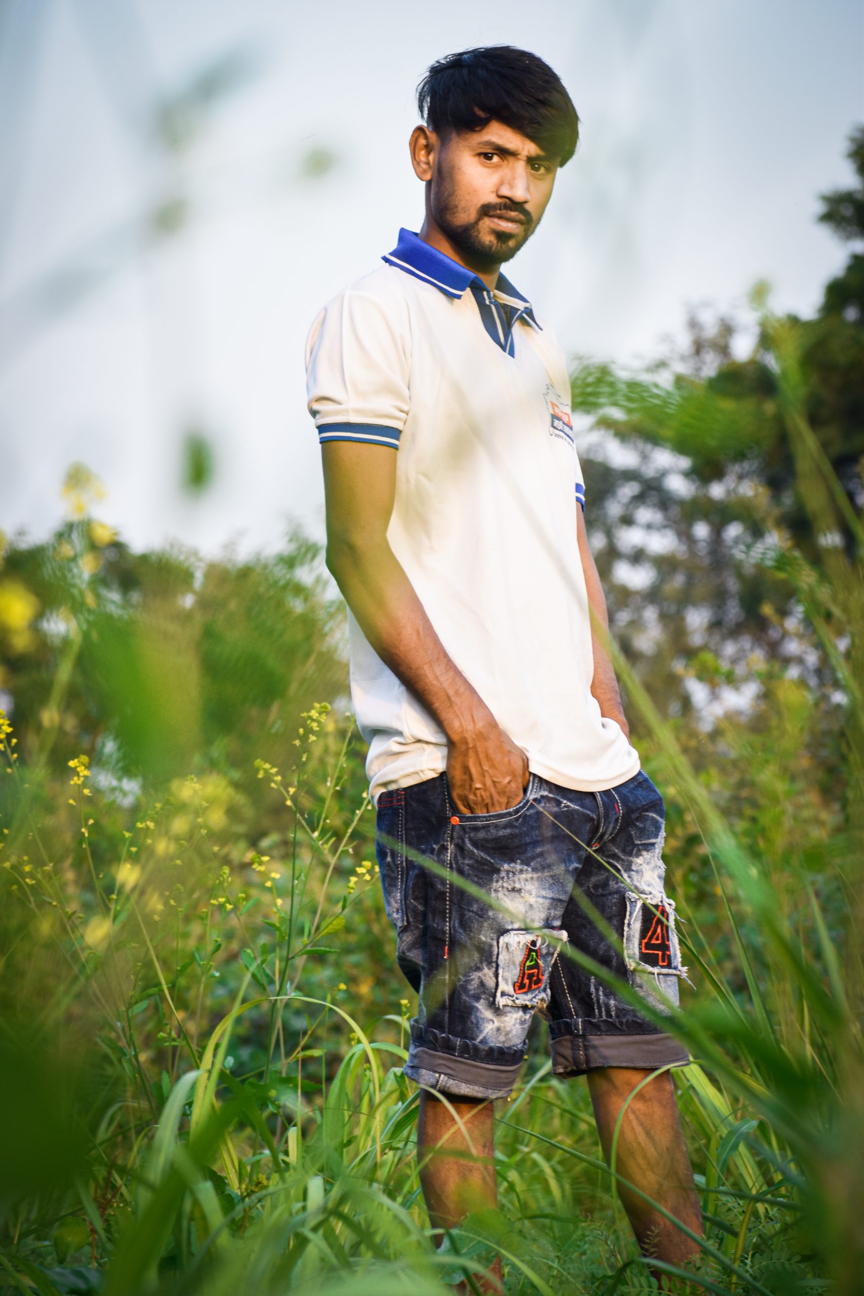 Boy posing in the crop farm