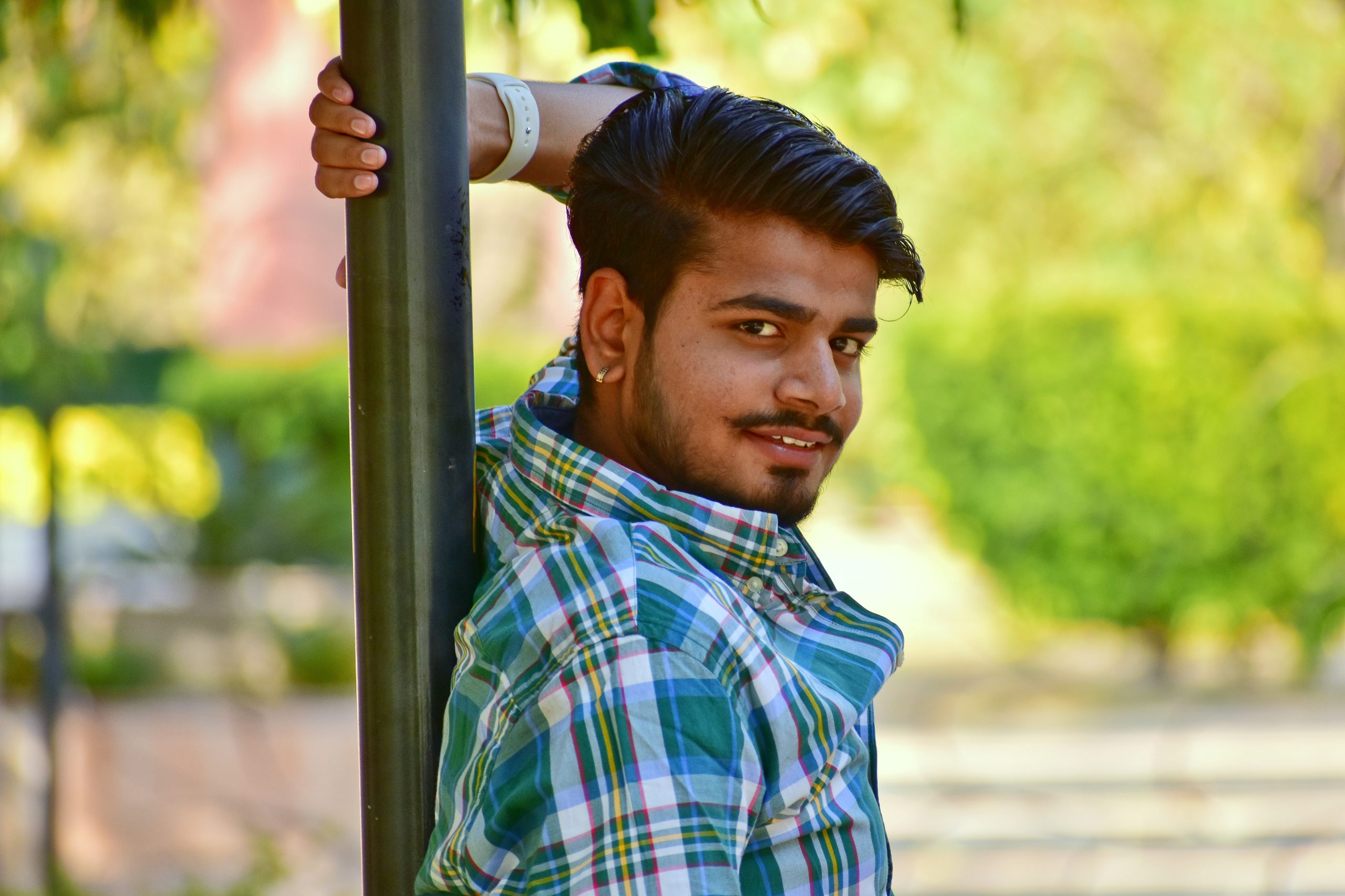 Stylish boy posing on the street - PixaHive