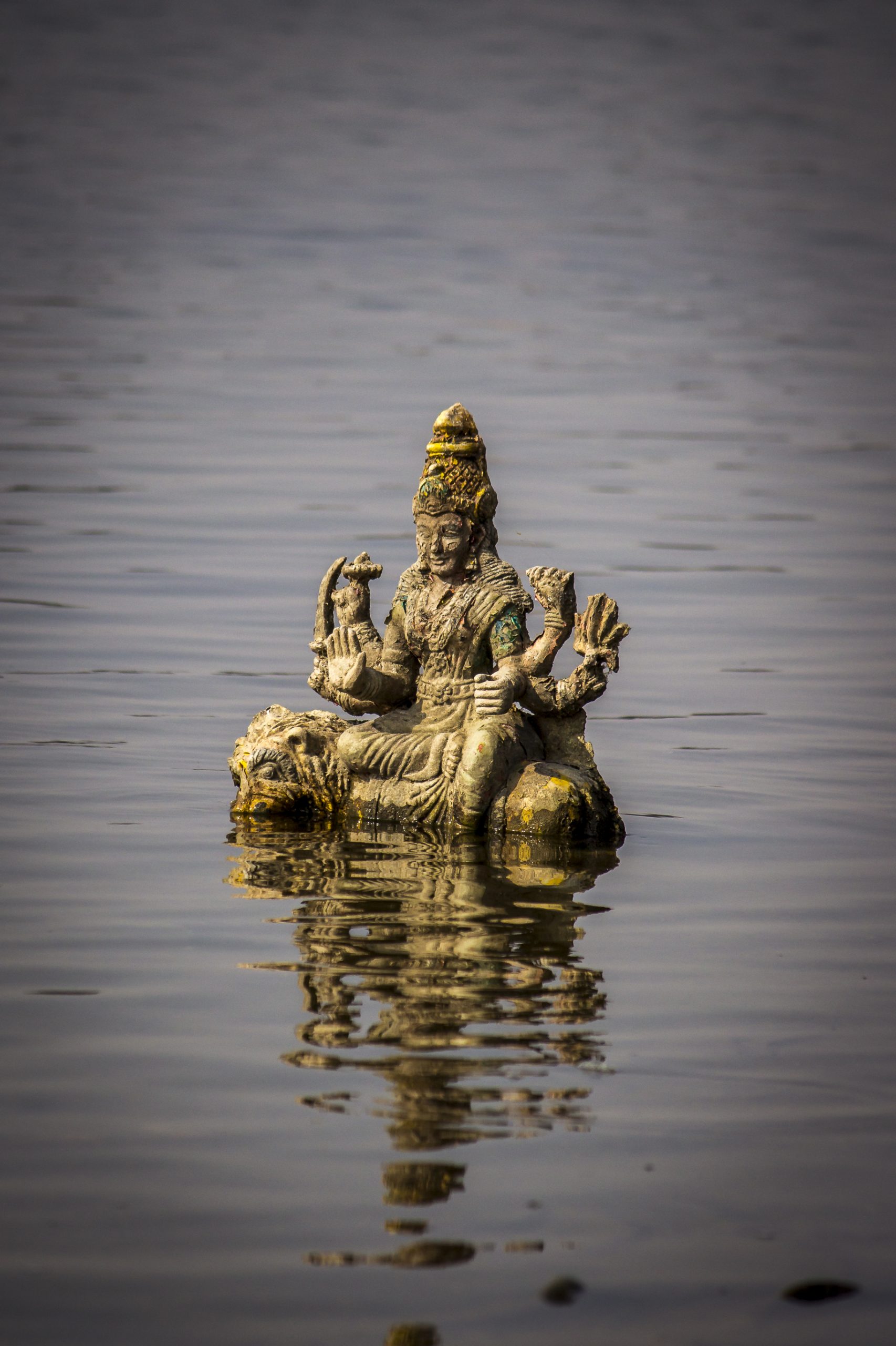Hindu goddess sculpture in water