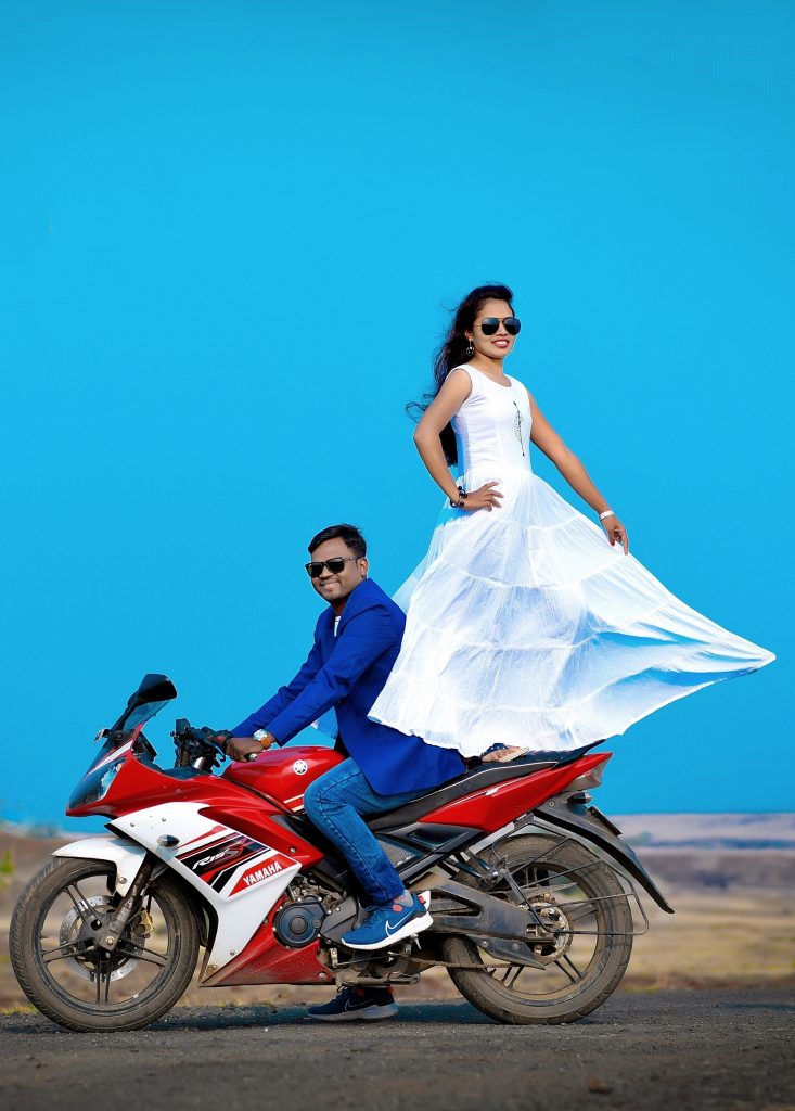 Happy Couple Posing Near Motor Bike With Sandwitches And Coffee Stock  Photo, Picture and Royalty Free Image. Image 53595961.