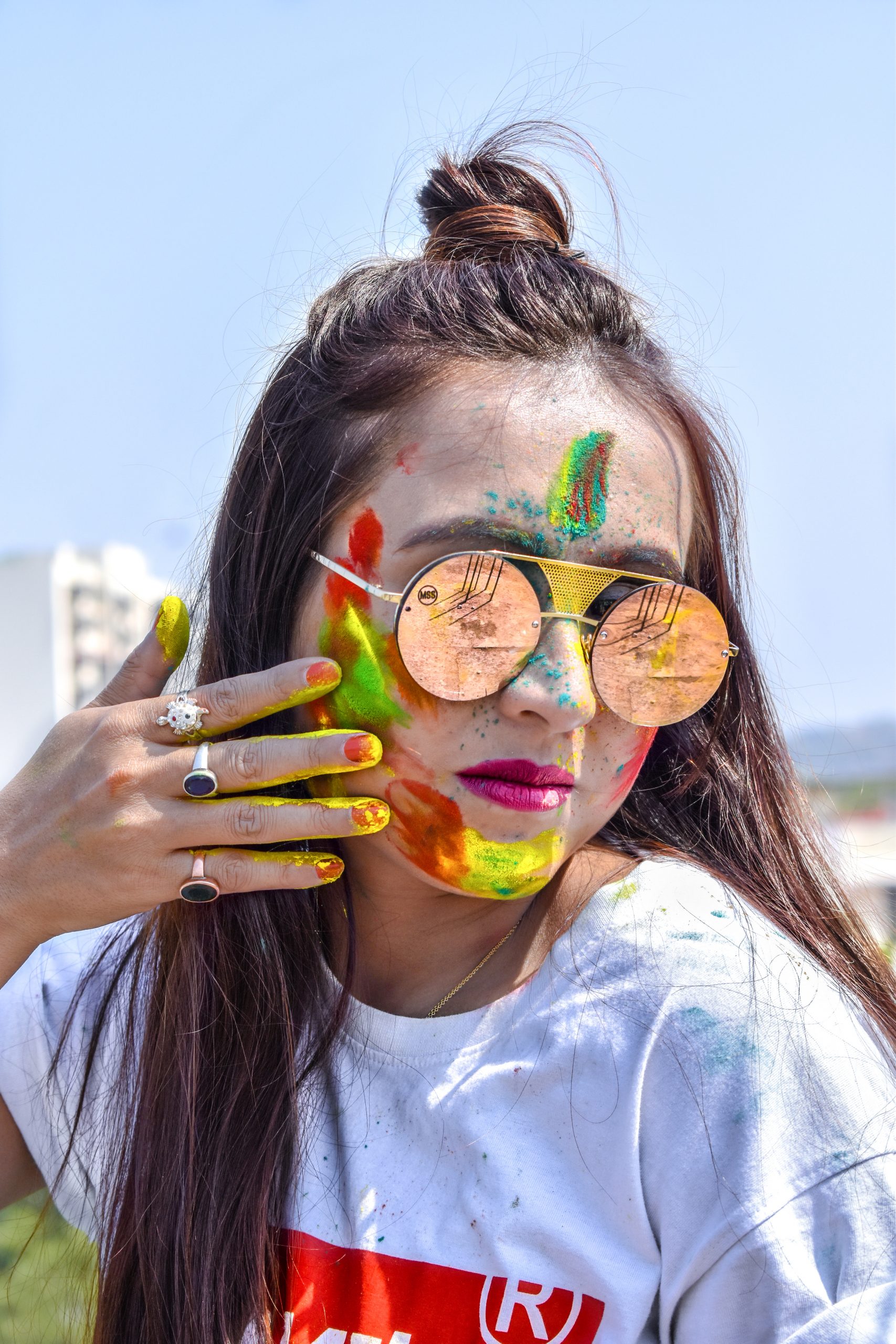 Girl with long hair ready for celebrating Holi