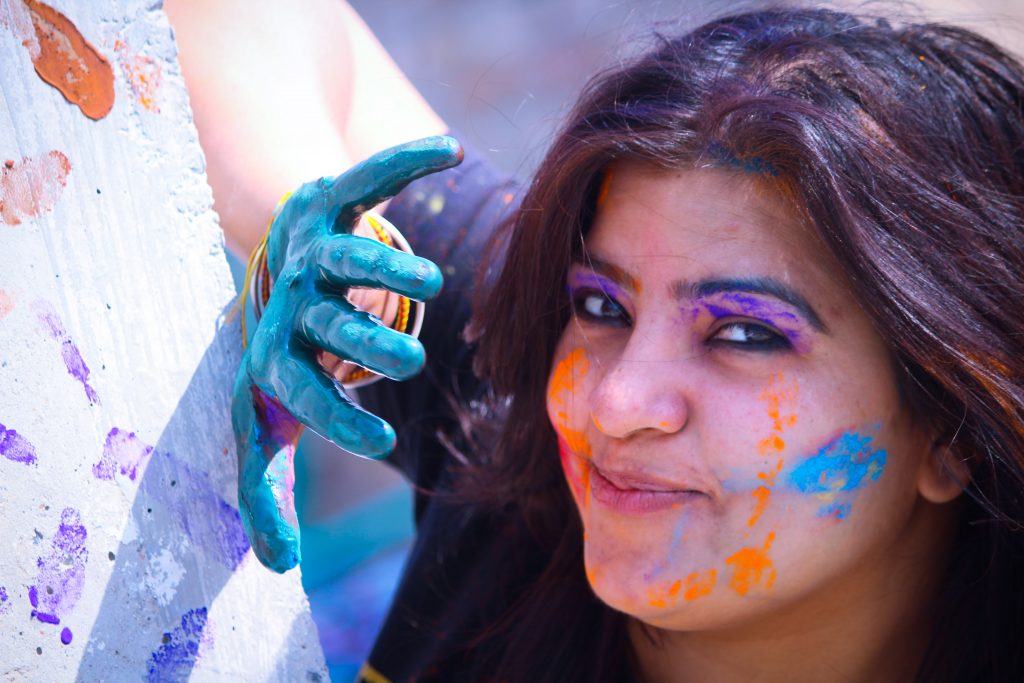 A happy girl during Holi festival - PixaHive