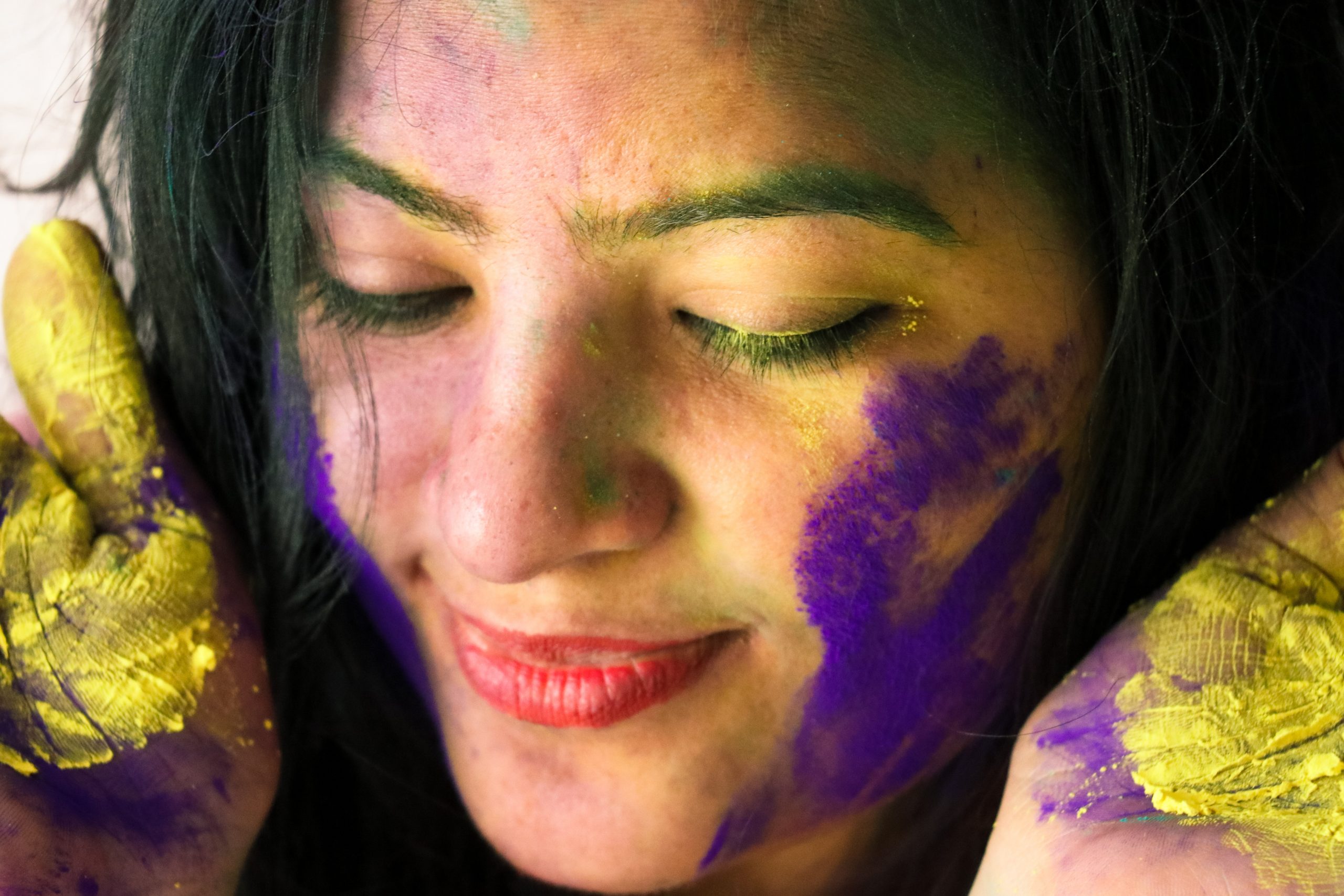 Holi colors on a girl's face