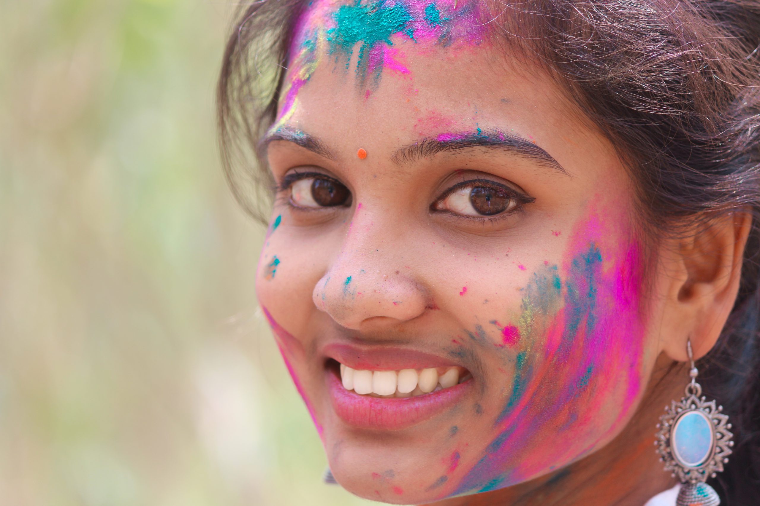 Holi colors on a girl's face