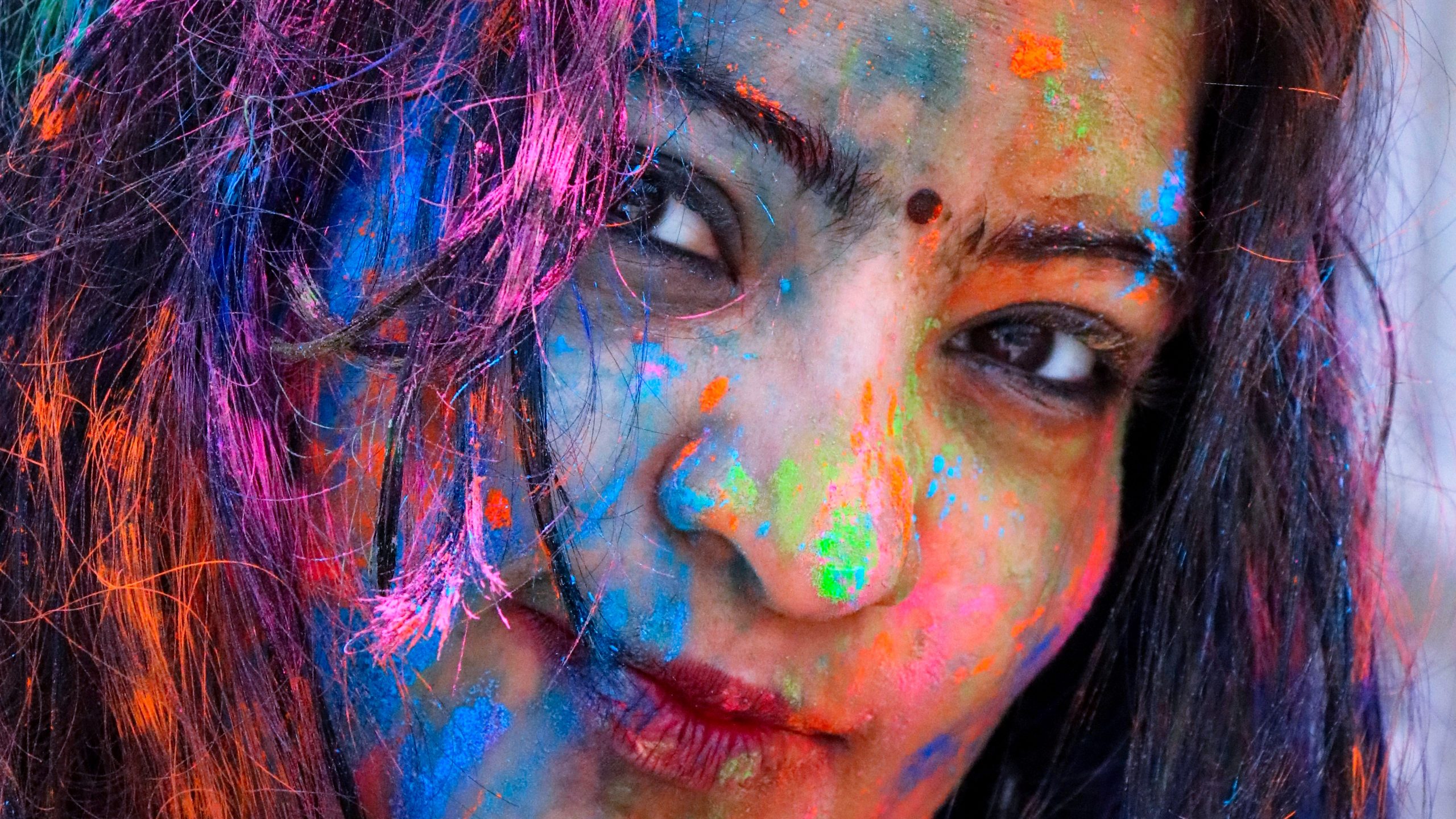 Holi colors on a girl's face