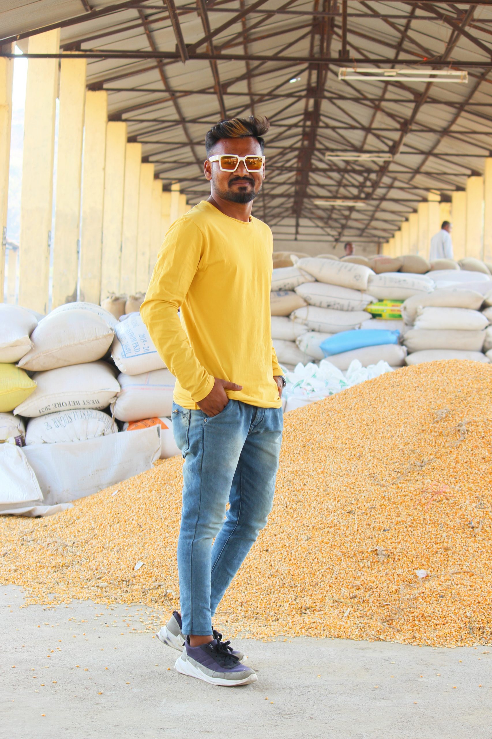 Boy posing in the wheat store