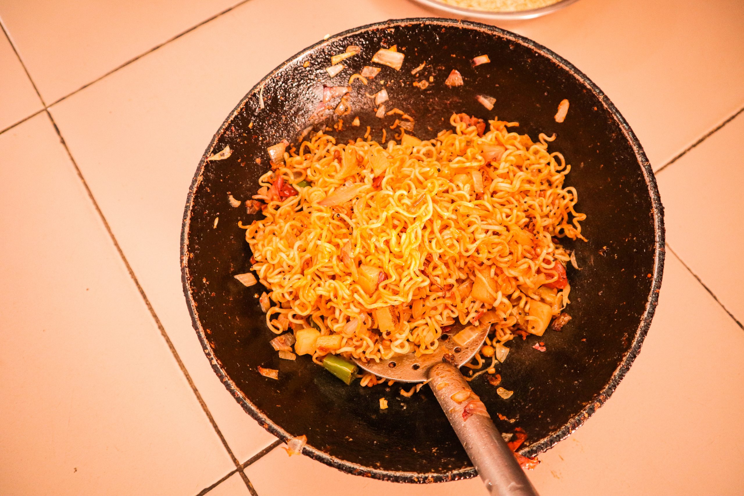 Maggi noodles in a frying pan