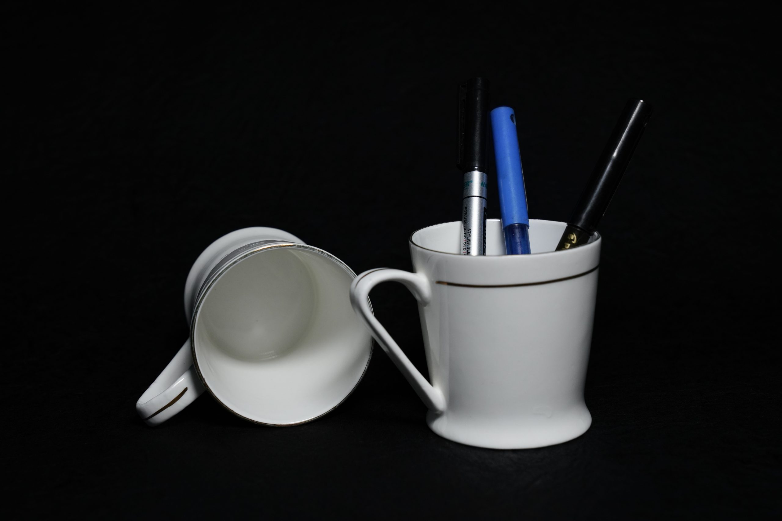 Pens in a cup
