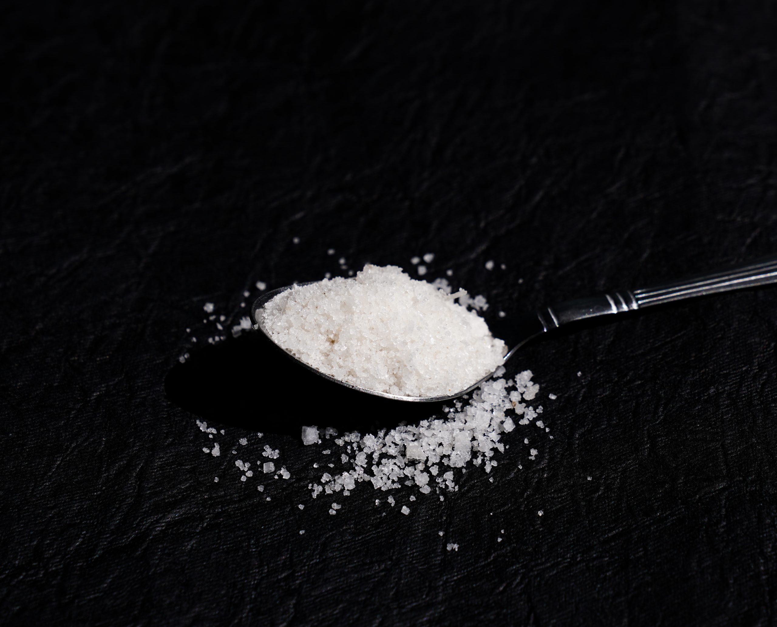 Salt powder in a spoon