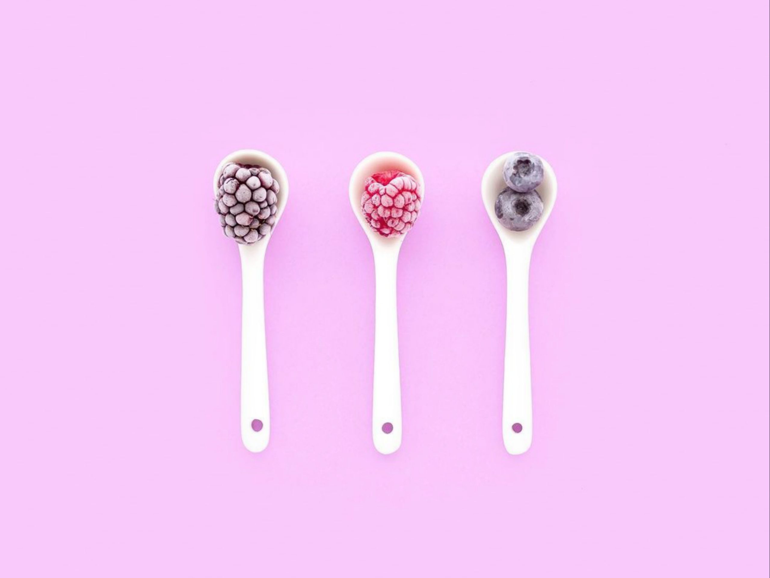 Spoons filled with berries