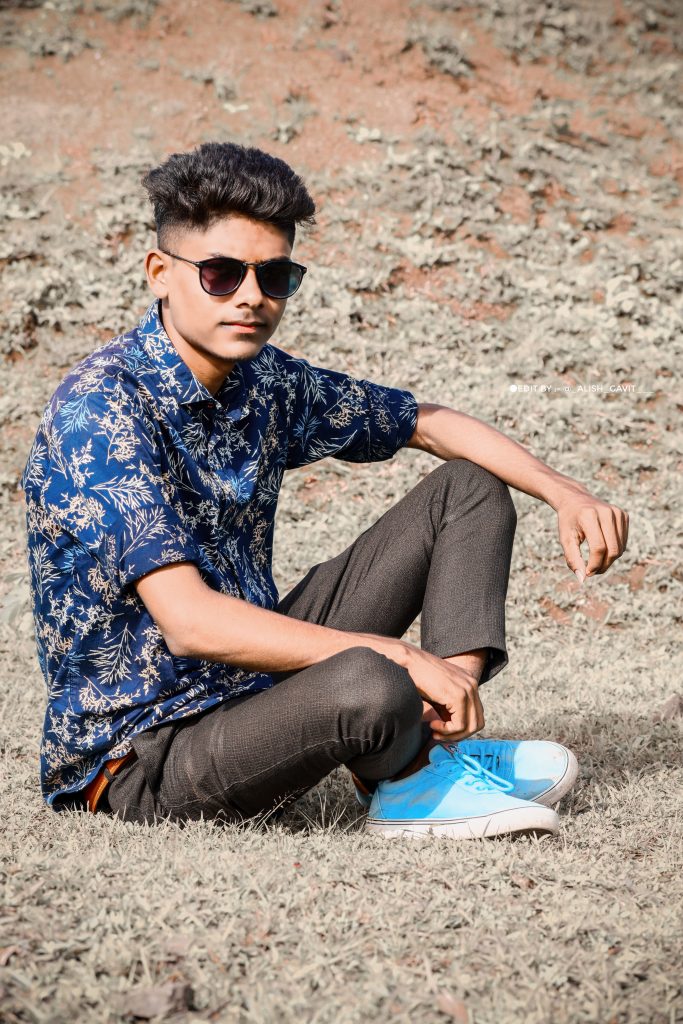 Free Photo | Portrait of young stylish indian man model pose in street  sitting on bench and hold smartphone at hand