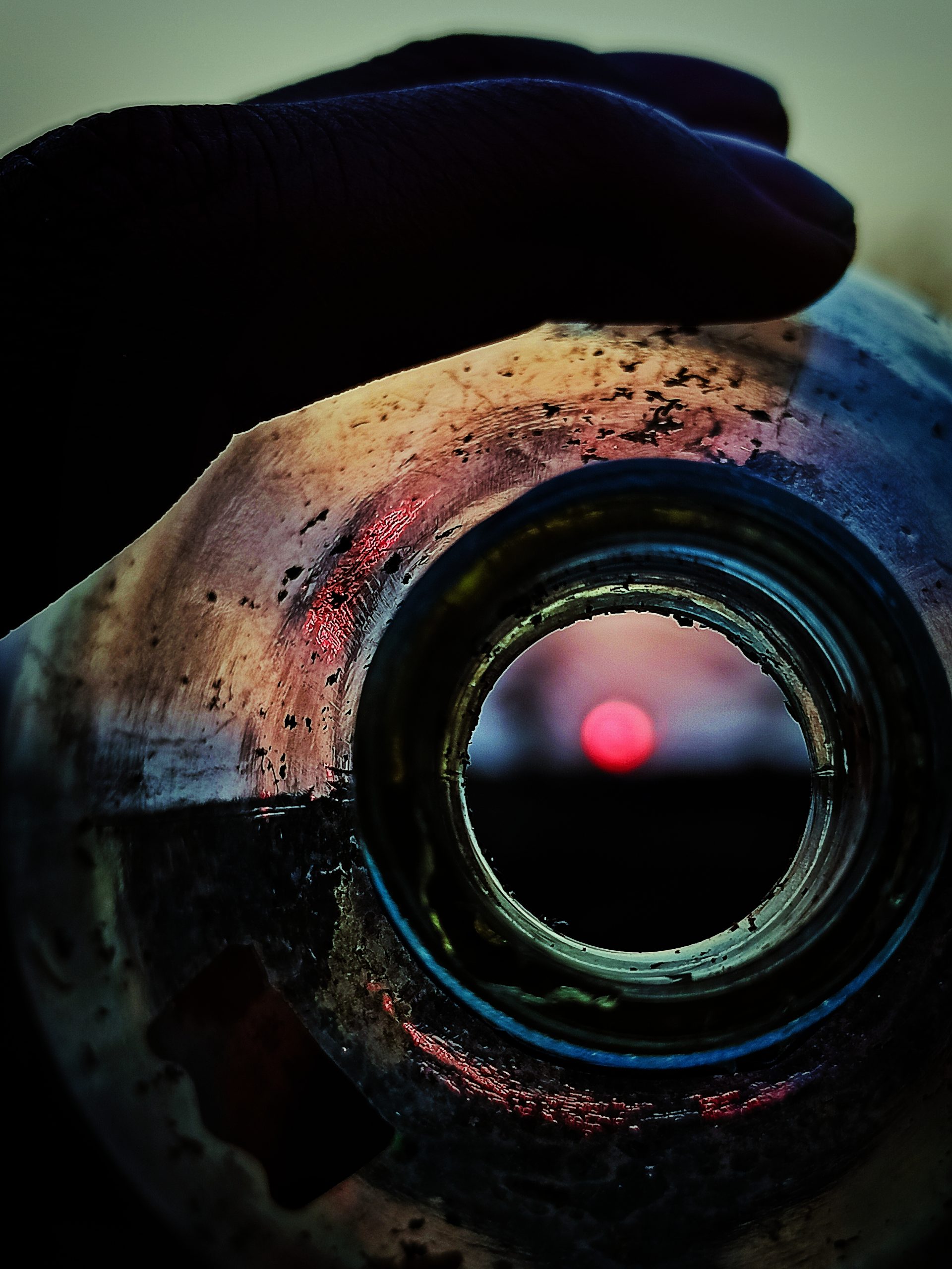 Sunset through glass bottle