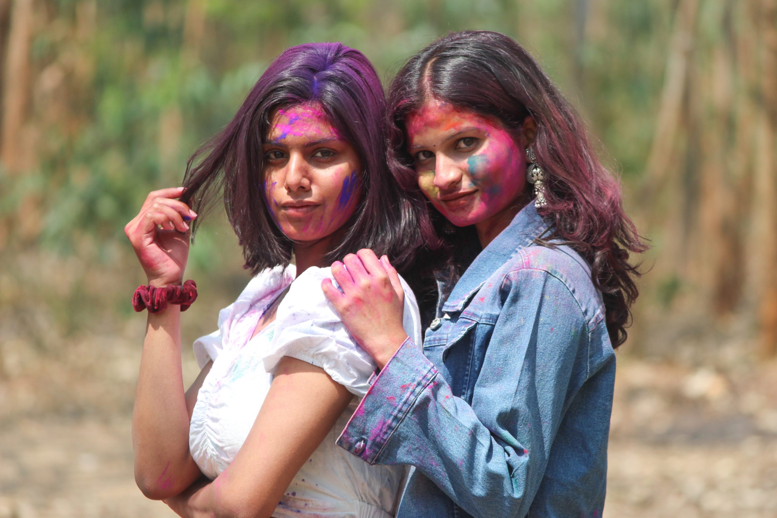 Two girls enjoying Holi festival