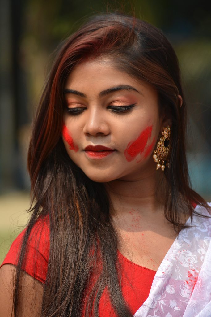 Beautiful girl with Holi color on her face - PixaHive