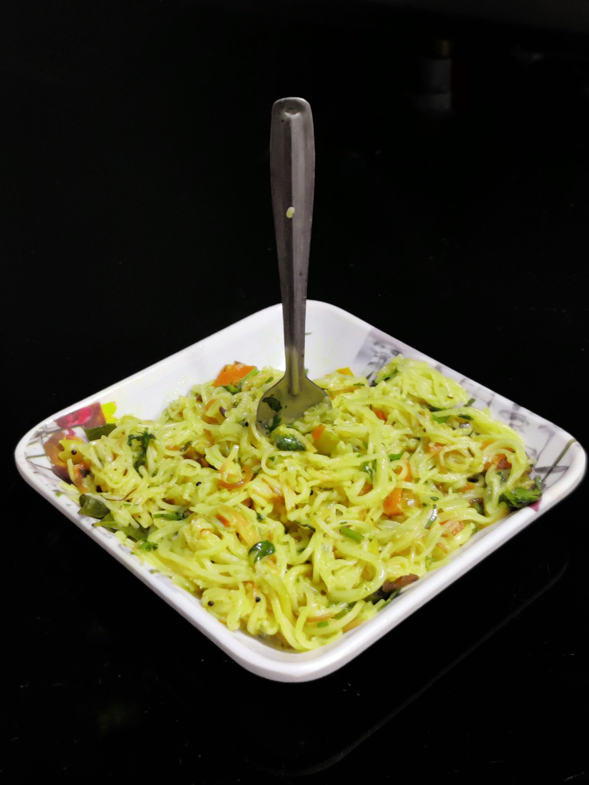 Vegetable noodles on a bowl