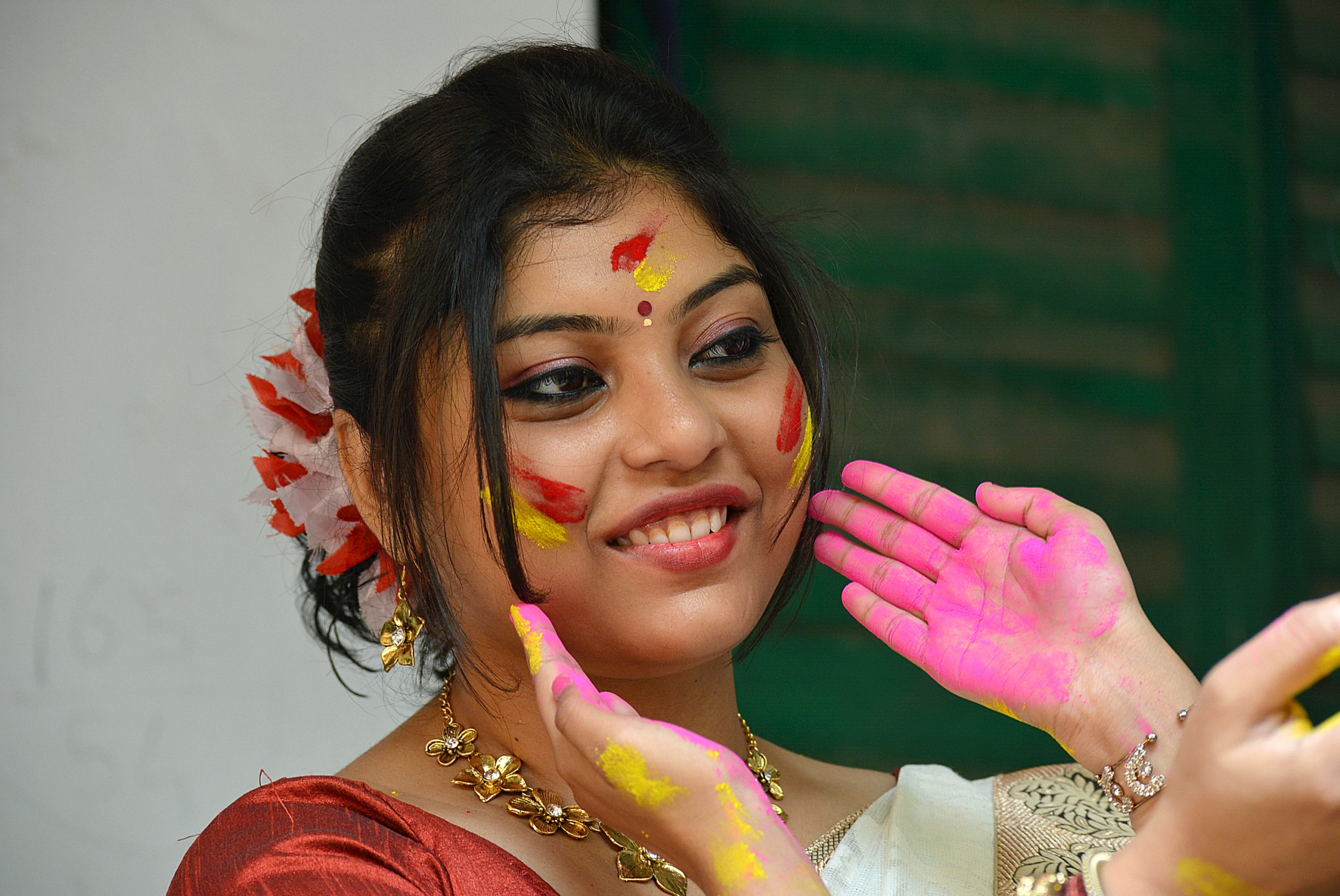 A woman celebrating holi festival