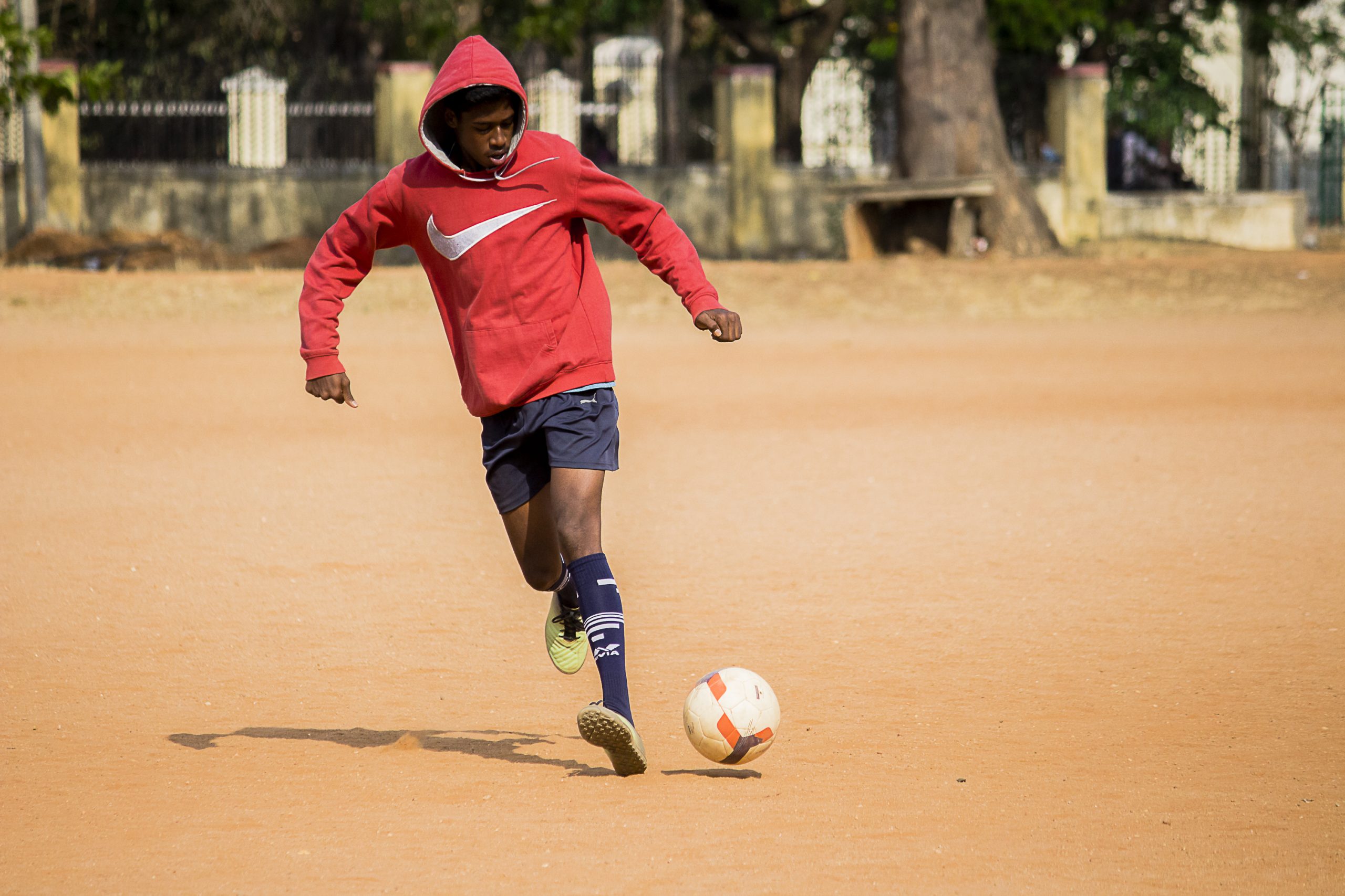 A boy playing football