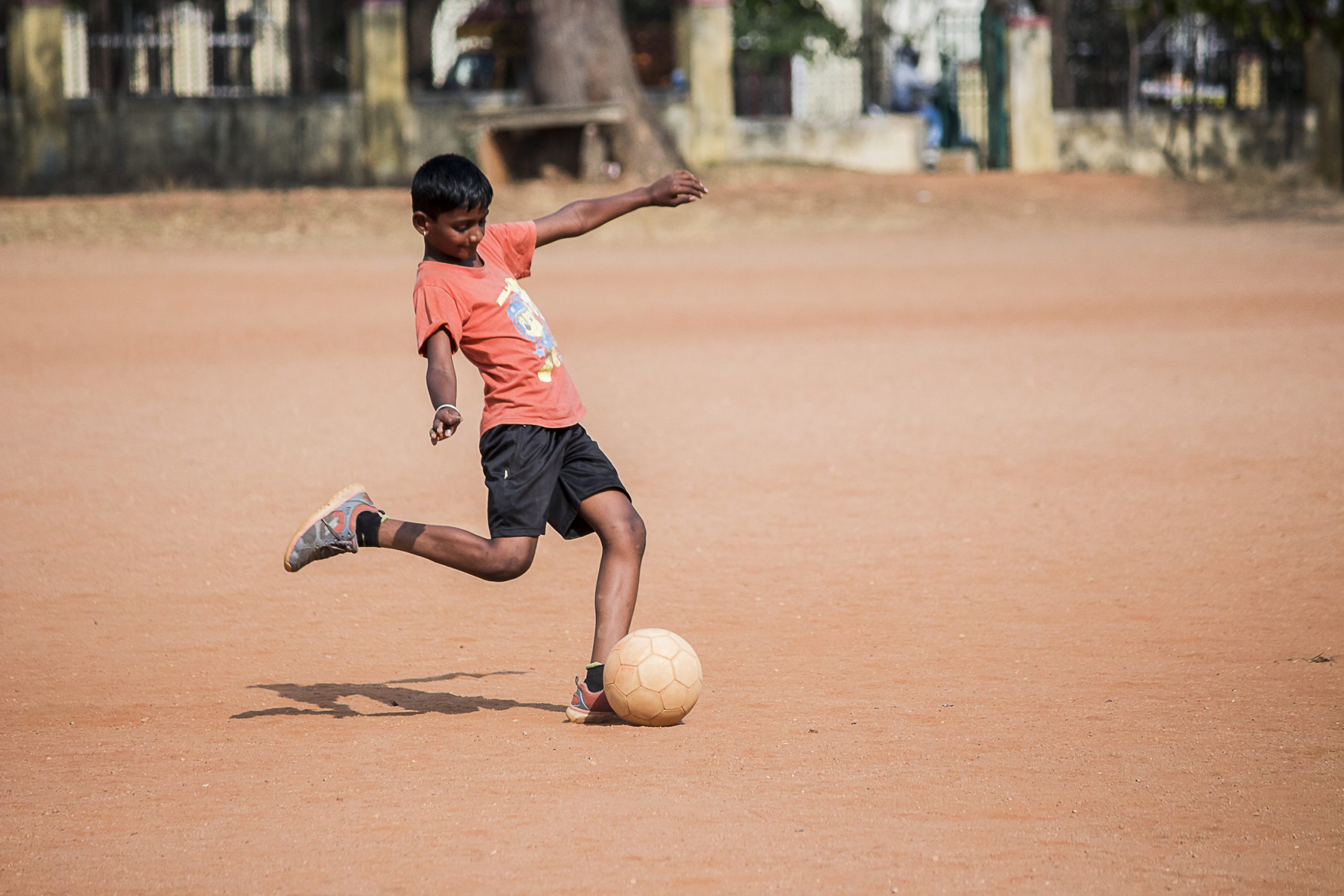 A boy playing football