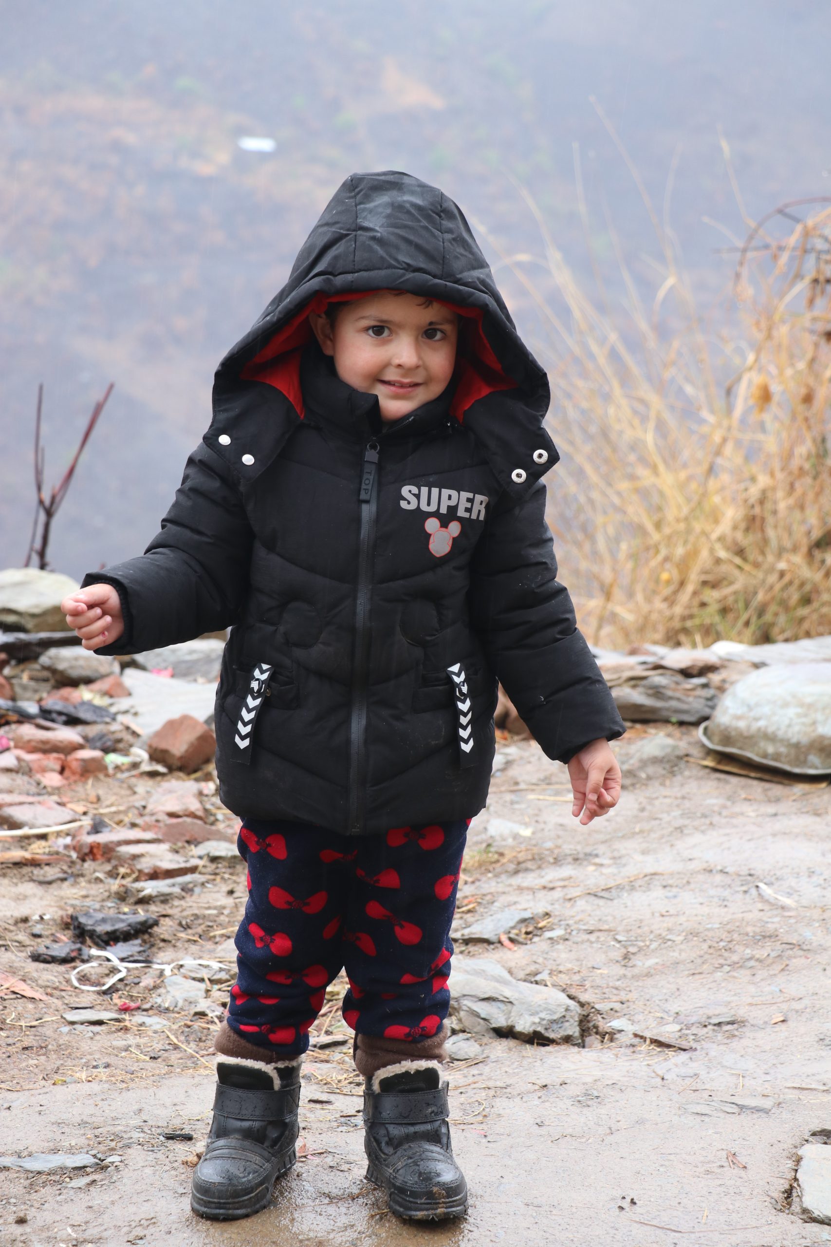 Cute little girl in hills