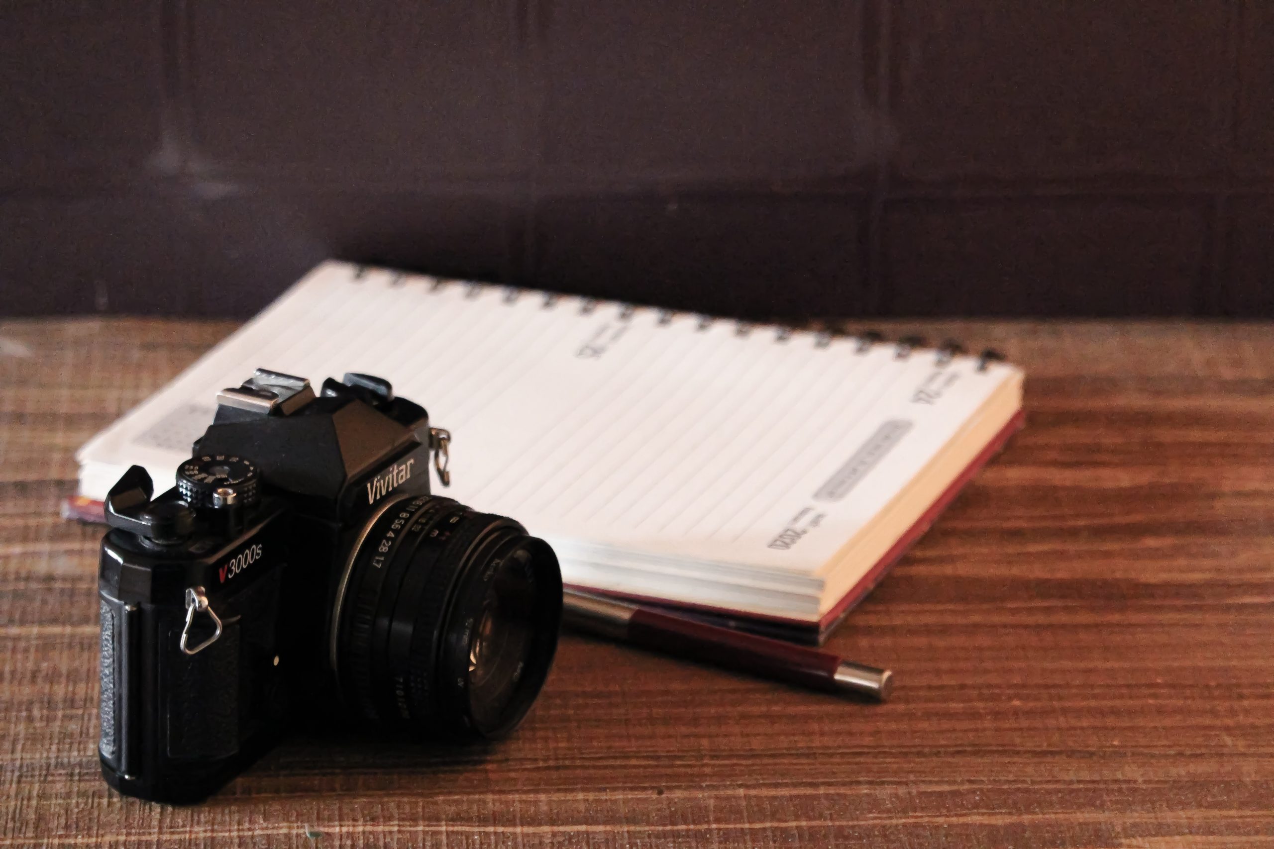 A camera and a notebook