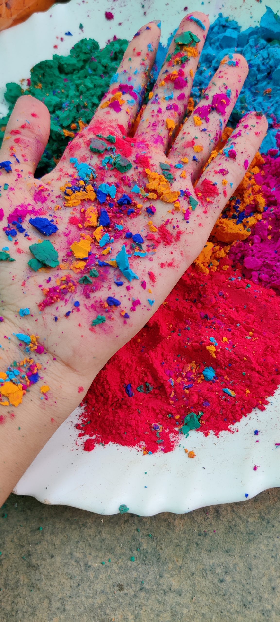 Holi colors in hand