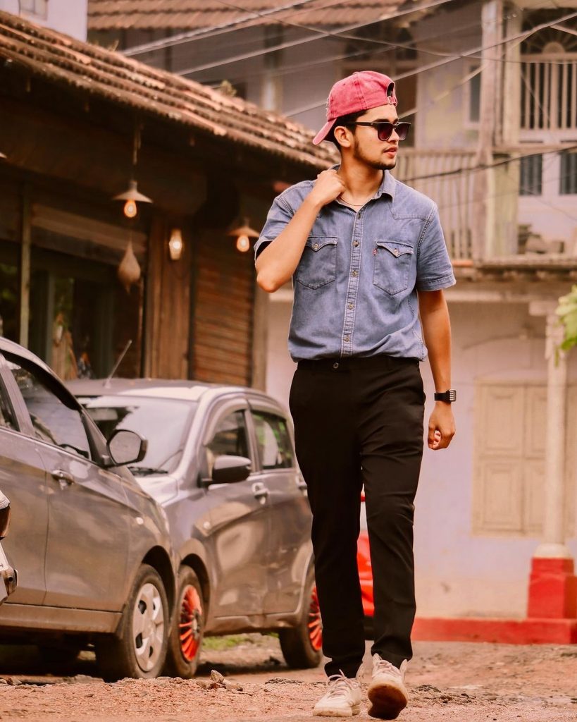 A stylish boy walking in a street - PixaHive